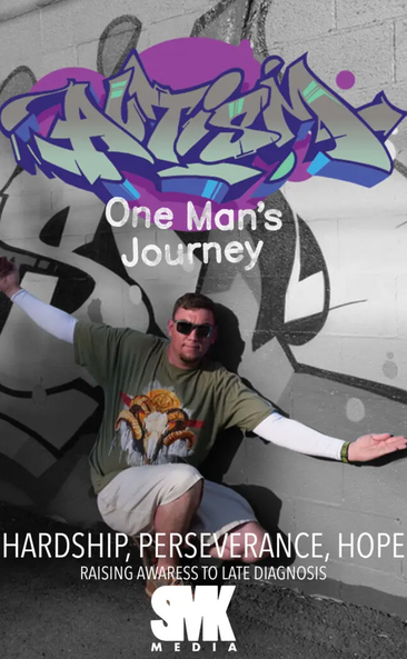Scott Klumb in front of his One Man's Journey poster