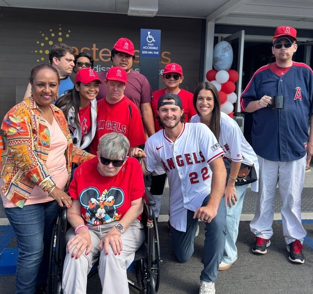 Bryce & Brooklyn Teodosio with Pyott participants in front of the Adult Day Center.  