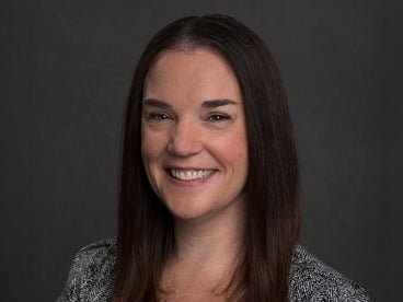 A headshot of Jennie Myhra.