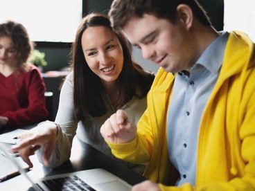 person in yellow sweater
