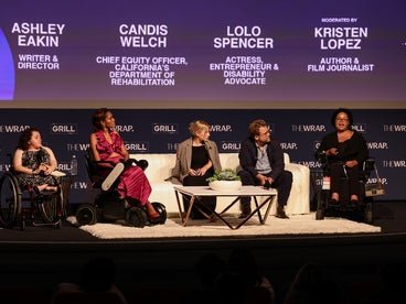 Several panelist on stage during a discussion.