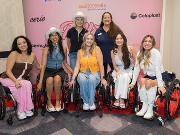 Easterselas staff members standing behind the Rollettes at the Rollettes Experience 2025