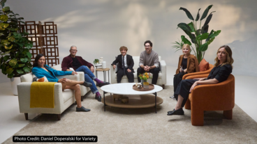 Group of six individuals seated in a modern living room setting with stylish furniture and plants, participating in a discussion. Photo Credit: Daniel Doperalski for Variety.