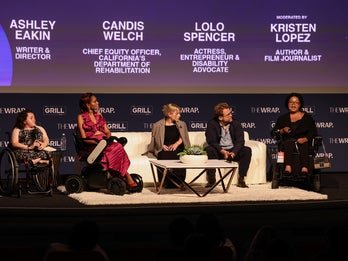 Several panelist on stage during a discussion.