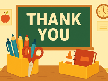 classroom desk with supplies and words 'Thank You' written on chalkboard