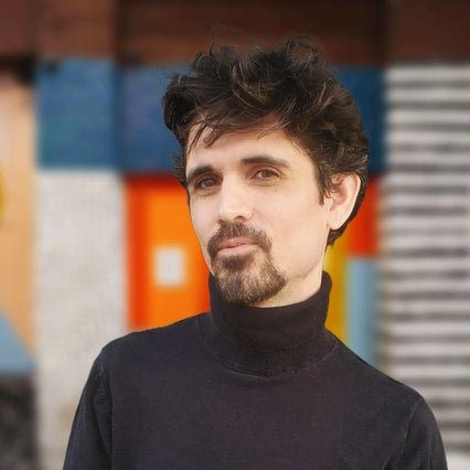 A headshot of AAB member Arman Khodaei. 