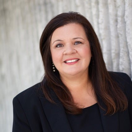 A headshot of COO Dr. Paula Pompa-Craven.