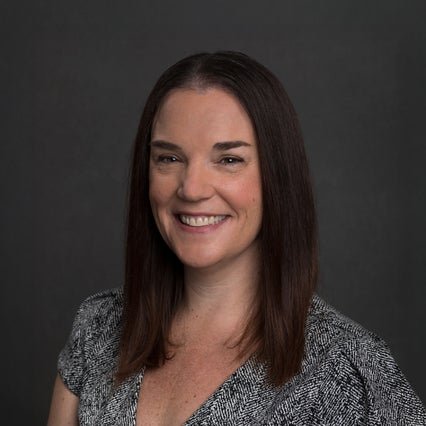 A headshot of Jennie Myhra.