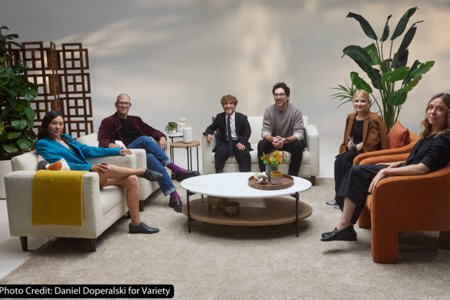 Five individuals sitting in a modern living room setting, engaged in a discussion for a Variety magazine interview. The room features stylish furniture, a large plant, and a scenic cloud backdrop. Photo credit: Daniel Doperalski for Variety.