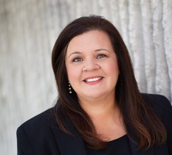 A headshot of COO Dr. Paula Pompa-Craven.